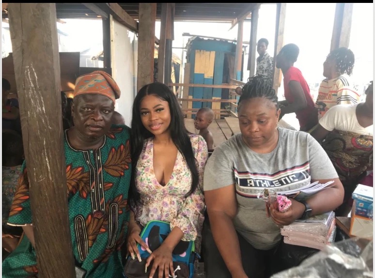 Community members gathered together at an open-air market